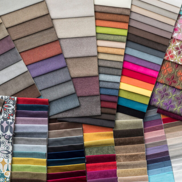 Image shows a variety of colorful chair fabrics