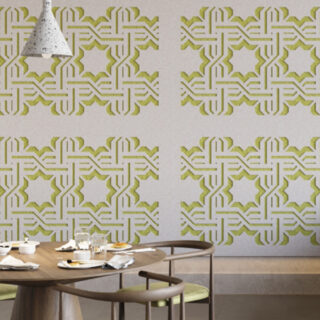 Green acoustic wall panels with a geometric pattern, designed by Ezobord.