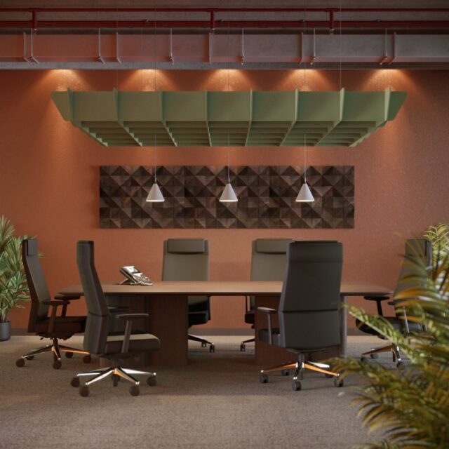 A green Ezobord Grid Canopy installed in a boardroom with a wooden wall and a conference table.